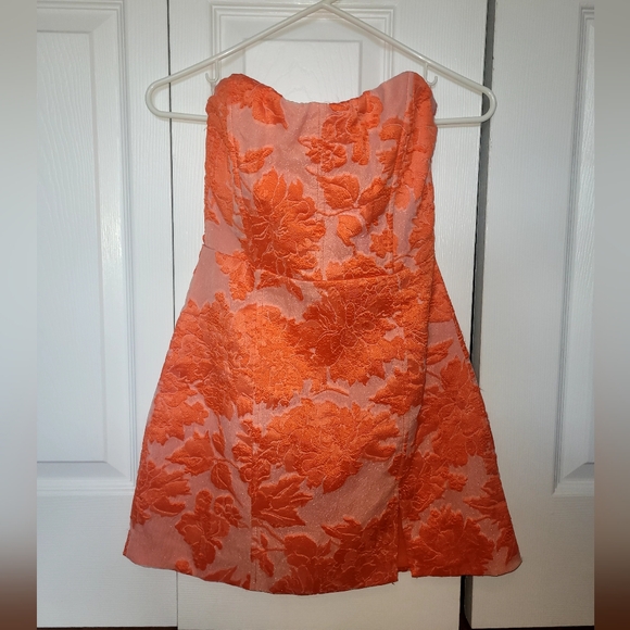 Showpo. Brailey Mini Dress - Strapless Dress in Orange Jacquard - Picture 2 of 7
